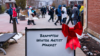 Sign with text Brampton Winter Artist Market with red bow