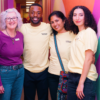 Photograph of four Brampton Arts Organization Volunteers posing together