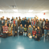 Photograph of BAO community members at the 2024 BAO Town Hall and Holiday Social