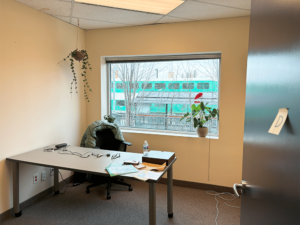 Photograph of Studio D, a small room with one window in the BAO office.
