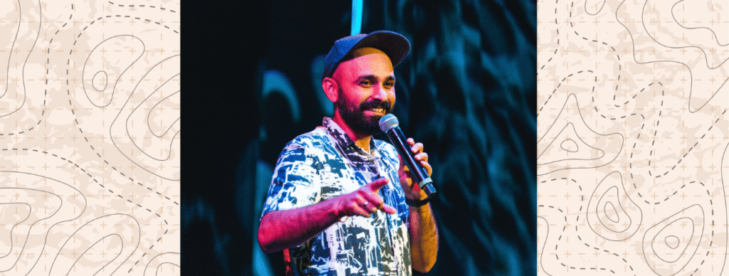 Photograph of Sunny Deewana, a South Asian man performing on a stage.